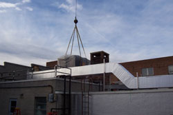 Rooftop duct system with support stands and venture-clad insulation jacketing
