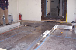 Custom fabricated electrical duct for in-floor wiring at medical facility renovation project